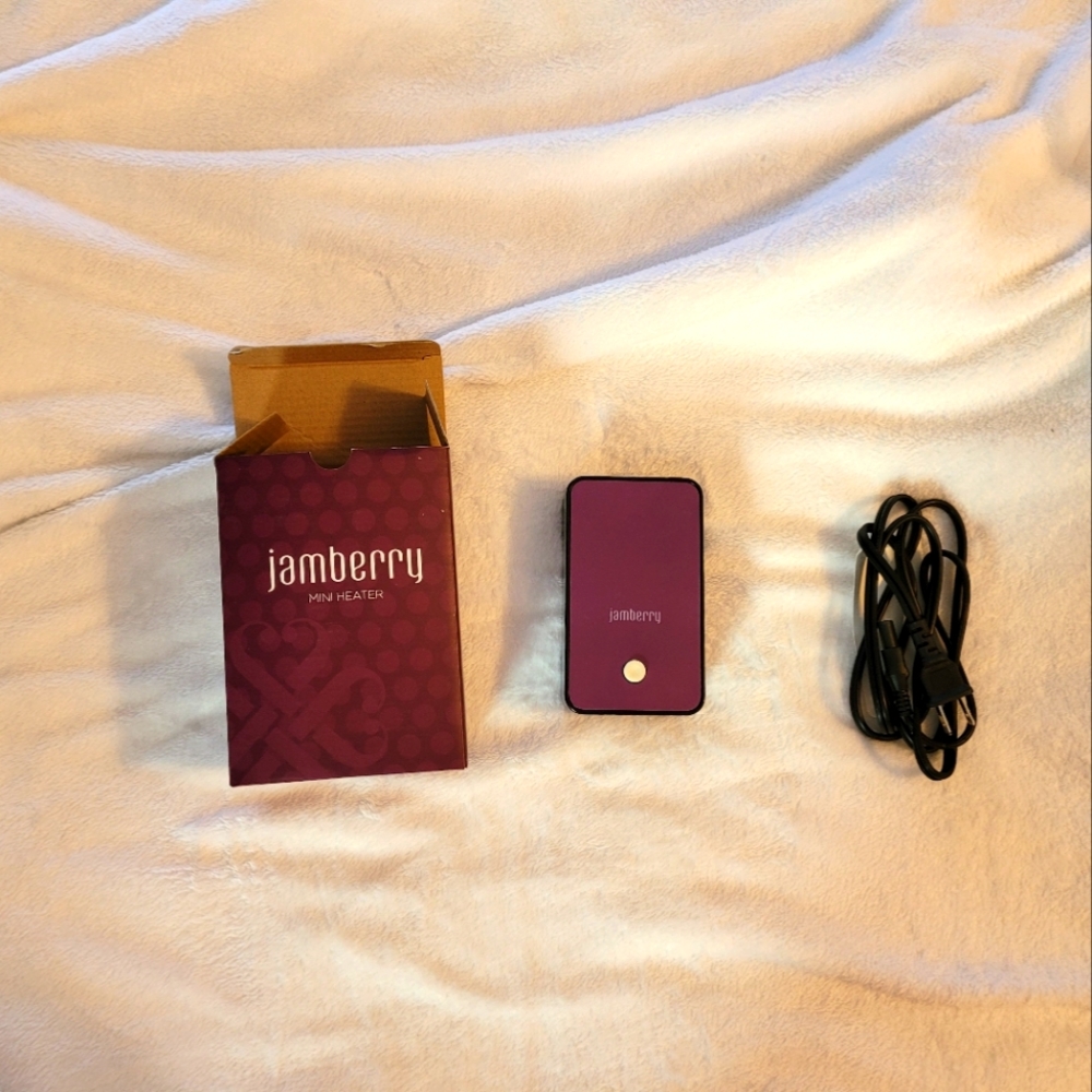 Jamberry heater, 5 kids size sets and 9 adult size sets of nail wraps